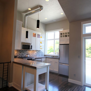 Urban LOFT style kitchen and dining area with multi function rolling island