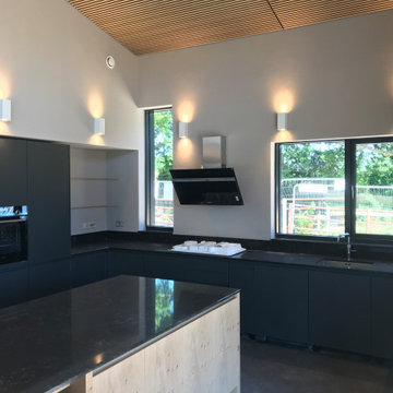 Vaulted kitchen with acoustic timber ceiling