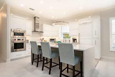 Example of a mid-sized transitional kitchen design in Tampa