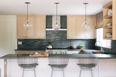 Example of a transitional u-shaped kitchen design in San Francisco with an undermount sink, shaker cabinets, light wood cabinets, gray backsplash, a peninsula and slate backsplash