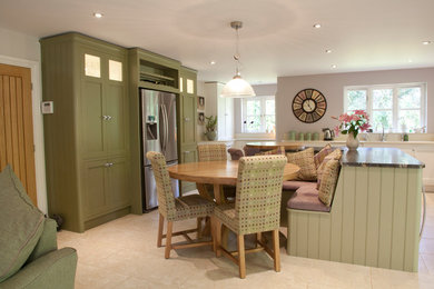 Design ideas for a large traditional u-shaped open plan kitchen in West Midlands with an island.