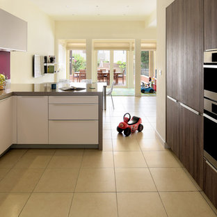 This is an example of a mid-sized modern l-shaped open plan kitchen in Other with an integrated sink, flat-panel cabinets, brown cabinets, quartzite benchtops, panelled appliances, porcelain floors, yellow floor and brown benchtop.