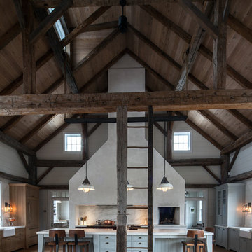 Vintage barn frame addition to Dutch stone house