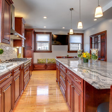 Viscont White granite countertops with Cherry cabinets