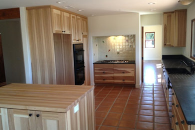 Example of a tuscan kitchen design in San Diego