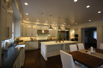 Transitional eat-in kitchen photo in New York