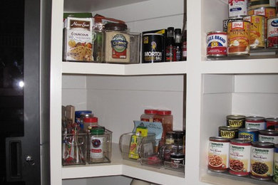 Inspiration for a large traditional kitchen pantry in Dallas.