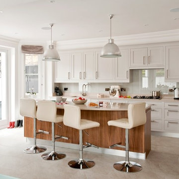 Walnut island complemented by leather stools
