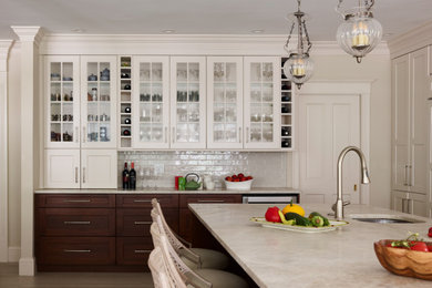 Inspiration for a timeless gray floor eat-in kitchen remodel in Boston with dark wood cabinets and an island