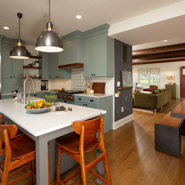 Warm Open Kitchen with Blue/Gray/Green Cabinets and Dark Wood