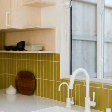 Warm Yellow Tiles Kitchen Backsplash