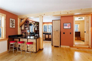 Example of an eclectic kitchen design in Burlington