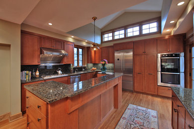 Inspiration for a craftsman medium tone wood floor kitchen remodel in DC Metro