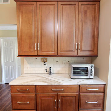 Waypoint Auburn Glaze Cabinets with Cambria Brittanicca Quartz Countertop