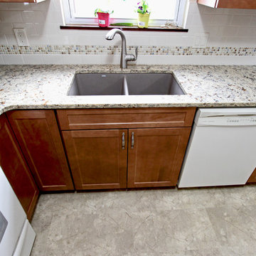 Waypoint Maple Spice Cabinets with Eternia Quartz Claremont Countertops