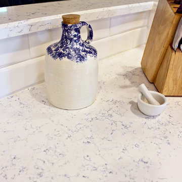 Waypoint Painted Linen Cabinets with Zodiaq Blue Carrara Quartz Countertop