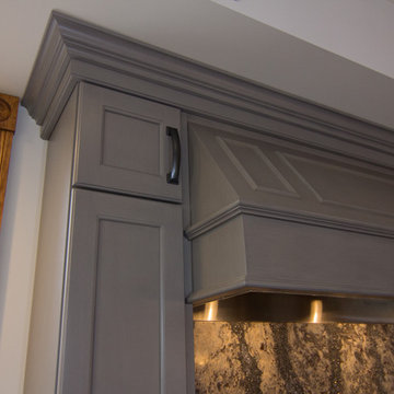 Well crafted cabinet details highlight the hood.