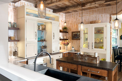 Inspiration for a mid-sized farmhouse l-shaped enclosed kitchen remodel in Tampa with an integrated sink, recessed-panel cabinets, white cabinets, zinc countertops, brown backsplash, wood backsplash, an island and gray countertops