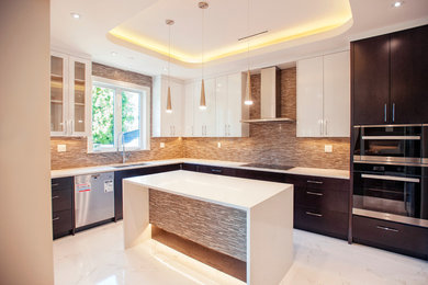 Inspiration for a mid-sized contemporary l-shaped marble floor and white floor kitchen pantry remodel in Vancouver with a double-bowl sink, flat-panel cabinets, white cabinets, matchstick tile backsplash, stainless steel appliances, an island, solid surface countertops and multicolored backsplash
