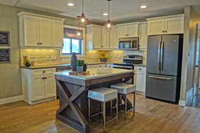 Inspiration for a transitional l-shaped light wood floor kitchen remodel in Toronto with an island