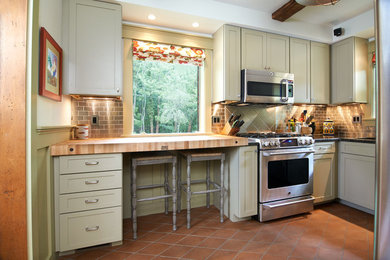 Inspiration for a small craftsman u-shaped terra-cotta tile and orange floor kitchen remodel in Cleveland with a single-bowl sink, recessed-panel cabinets, granite countertops, stainless steel appliances, no island, green cabinets, metallic backsplash and metal backsplash