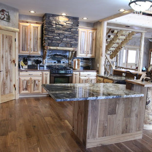Inspiration for a country eat-in kitchen in Chicago with louvered cabinets, light wood cabinets, onyx benchtops, medium hardwood floors and with island.