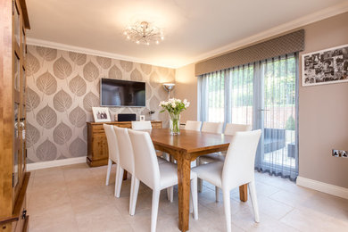 This is an example of a contemporary dining room in West Midlands.