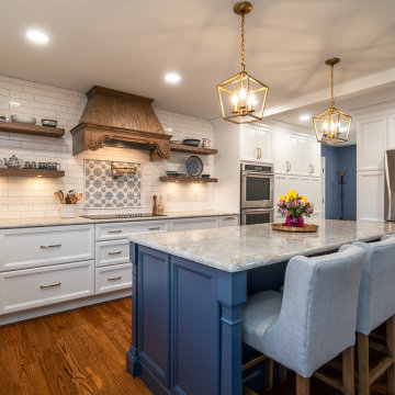 White and Blue Kitchen with Wood Hood