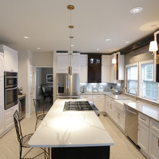 Design ideas for a mid-sized transitional u-shaped separate kitchen in DC Metro with a farmhouse sink, shaker cabinets, white cabinets, quartz benchtops, multi-coloured splashback, stainless steel appliances, porcelain floors, with island, beige floor and multi-coloured benchtop.