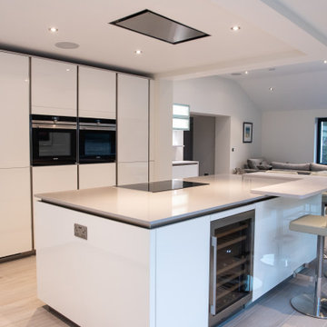 White and Cement Handleless Kitchen