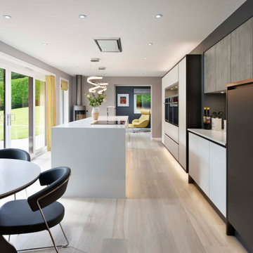 White & Graphite Handle-less kitchen with Boston Concrete details
