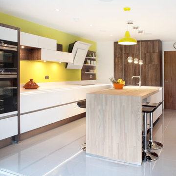White & wood effect matt kitchen with large island & breakfast bar