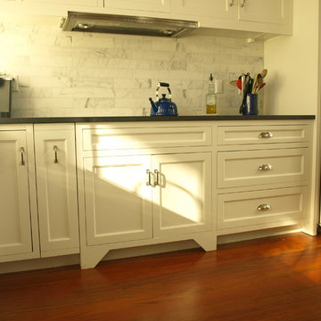 White Cabinetry with a Simple and Hidden Hood