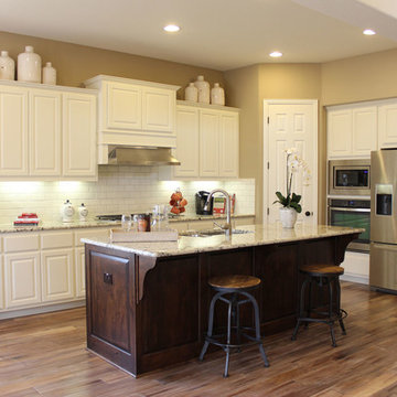 White cabinets - dark stained island by Burrows Cabinets