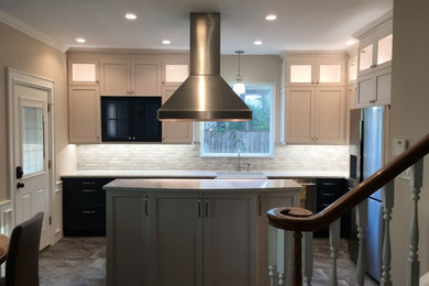 White cabinets with dark blue accents, interior lighting, undercabinet lighting,