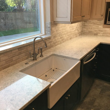 White cabinets with dark blue base cabinets, Farmhouse Sink with disposal button