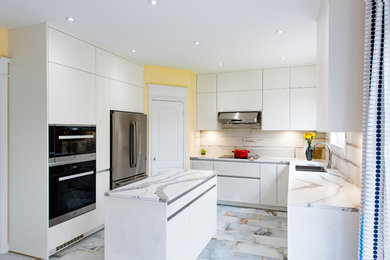 Inspiration for a mid-sized modern u-shaped multicolored floor kitchen remodel in Toronto with an undermount sink, flat-panel cabinets, white cabinets, white backsplash, stainless steel appliances, an island and white countertops