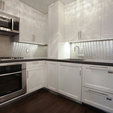White Contemporary Kitchen by Manhattan Restoration