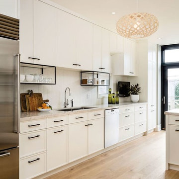 White Contemporary Kitchen by Sub- Zero Wolf
