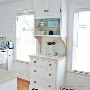 White Eclectic Kitchen with Two Tiered Peninsula