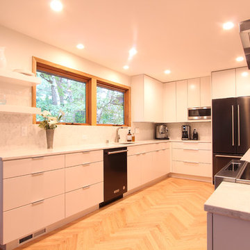 White Flat Cabinets, Herringbone Wood Floor, Quartz Countertops