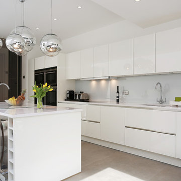 White gloss island kitchen