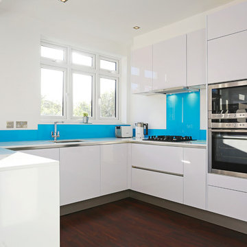 White gloss U shaped kitchen