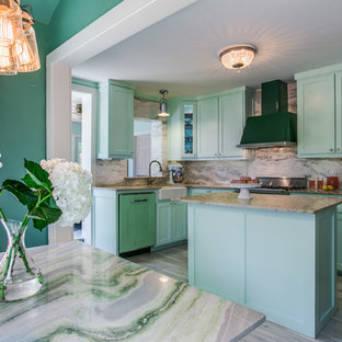 This is an example of a small eclectic l-shaped eat-in kitchen in Dallas with a farmhouse sink, shaker cabinets, green cabinets, quartzite benchtops, green splashback, stone slab splashback, coloured appliances, ceramic floors and with island.