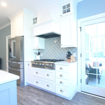 White Kitchen Cabinets with Farmhouse Sink and Gray Island