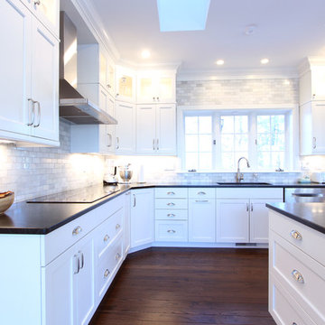 White Kitchen Cabinets with Marble Subway Tile and Soapstone Countertop