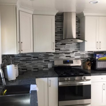 White Kitchen- Gray Tile Backsplash