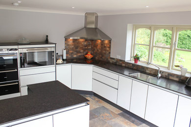 Inspiration for a medium sized contemporary kitchen in Wiltshire.