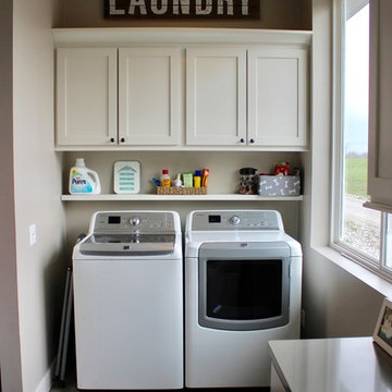 White Kitchen w/ Laundry Area