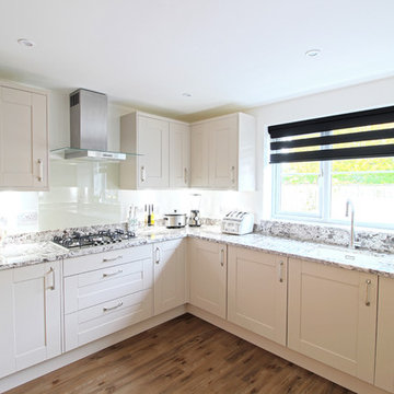 White Kitchen with a Marble worktop